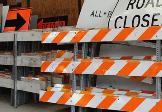 All-Brite barricades and traffic barrels guiding a work zone
