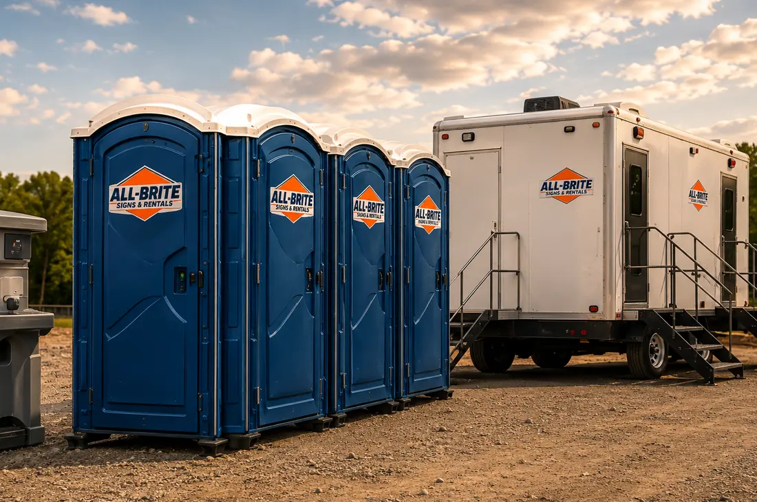 All-Brite portable restrooms, hand-wash station and restroom trailer set up on a jobsite