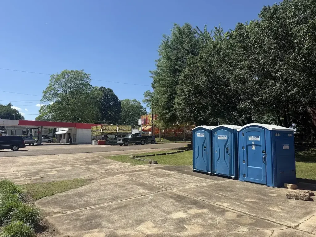 Portable toilets serving a ballfield and recreation area